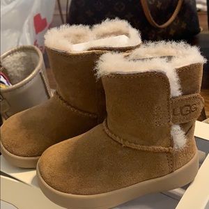 Tan Uggs- worn once before our daughter walked